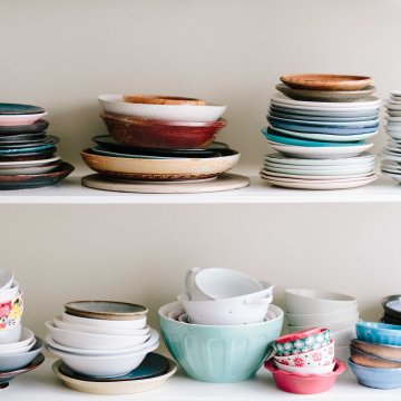 messy pile of dishes on a counter